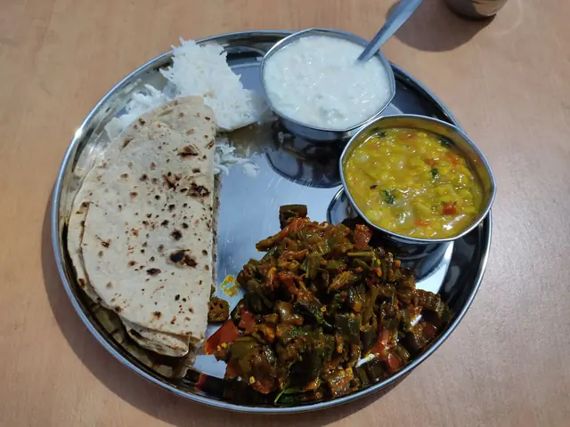 A home-style Indian thali with roti, rice, dal and sabzi for a PCOS diet